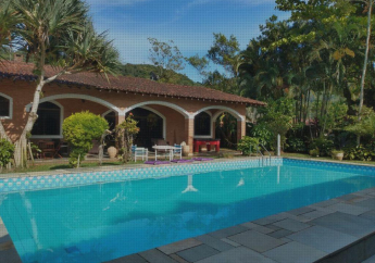 Hotel Casa com piscina em condomínio fechado no Guarujá