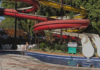 Hotel Golden Dolphin Grand Hotel Resort quarto privativo e varanda para piscinas roupas de cama